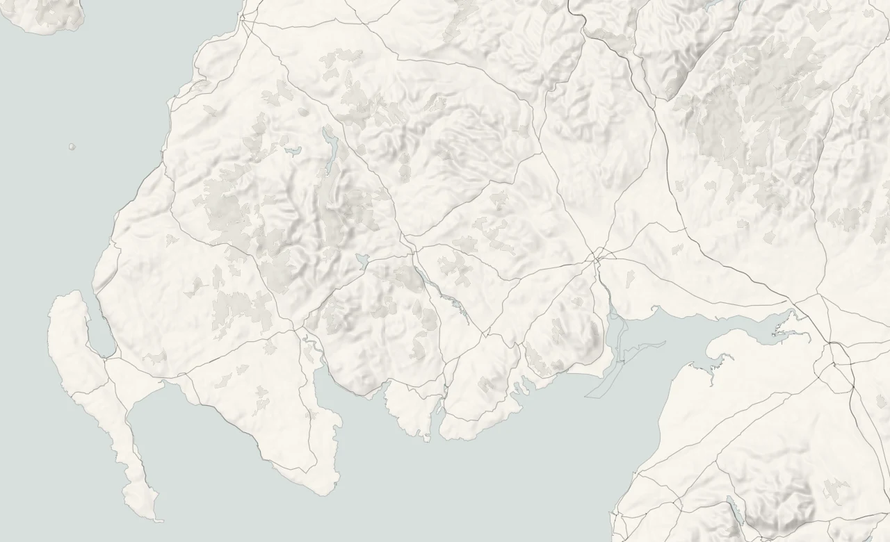 A map of Dumfries and Galloway in relief, with its towns and villages and its four parts