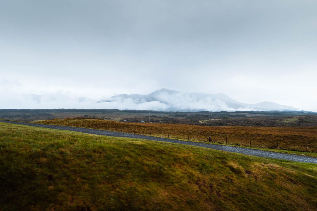 The moorland round the Commando Memorial and the snow-streaked hills of the Nevis range.