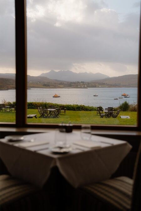 A window table looking out over Portree Bay.