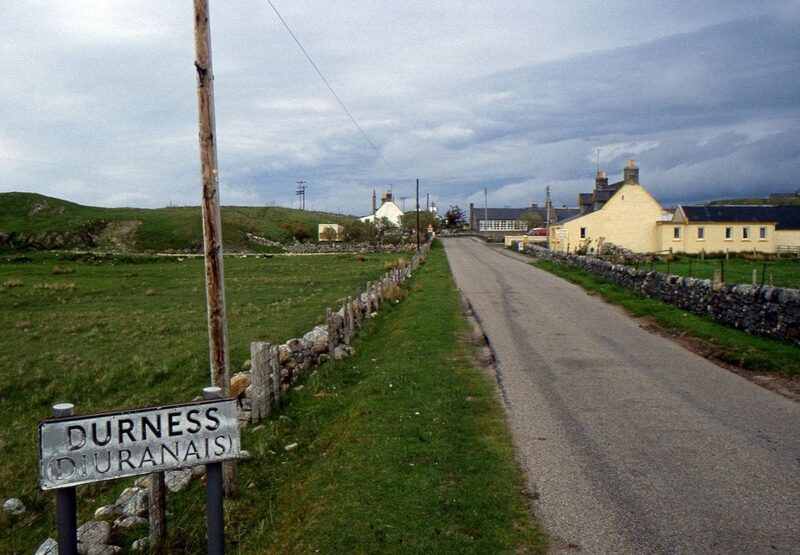 Durness and Diùranais road sign beside a lane leading into the village